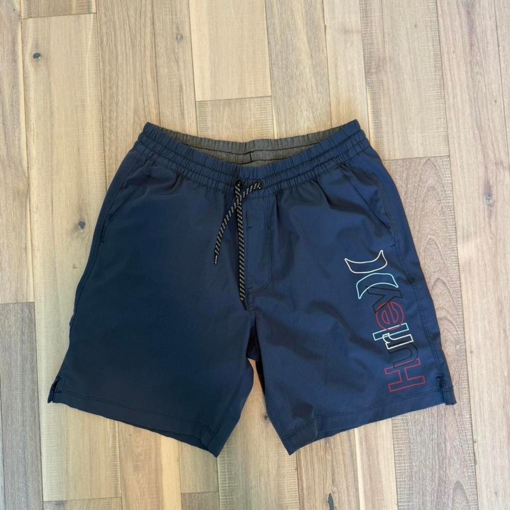 Hurley navy blue swim shorts with drawstring waistband and pockets. Size M